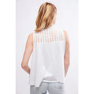 So fun for warm weather, this sleeveless Free People Sunkissed Top in Ivory is loose and easy, perfect with any shade of denim. Handkerchief hemline and lace panels along the front, shoulders and back.  Free People Sunkissed Top in Ivory